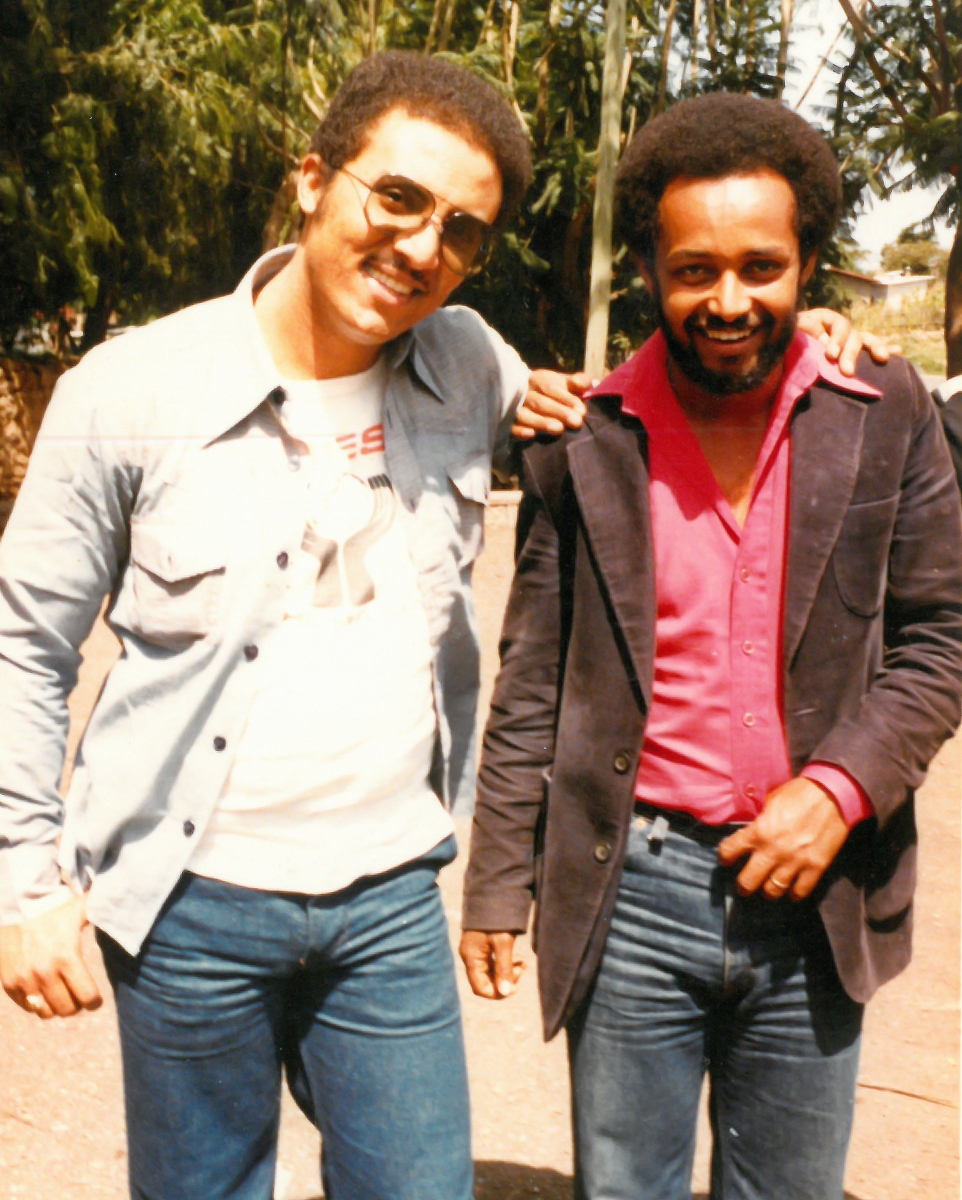 A photo of Giovanni Rico and Selam Woldermarian walking in the streets of Dire Dawa, Ethiopia, in 1978